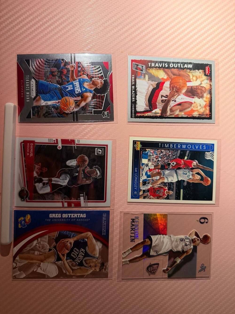 Mixed NBA Basketball Card Lot featuring Terance Mann RC, Travis Outlaw, Kenyon M